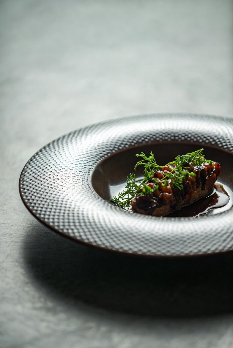 The Culinary Study — gourmet dish photography with dramatic shadow play